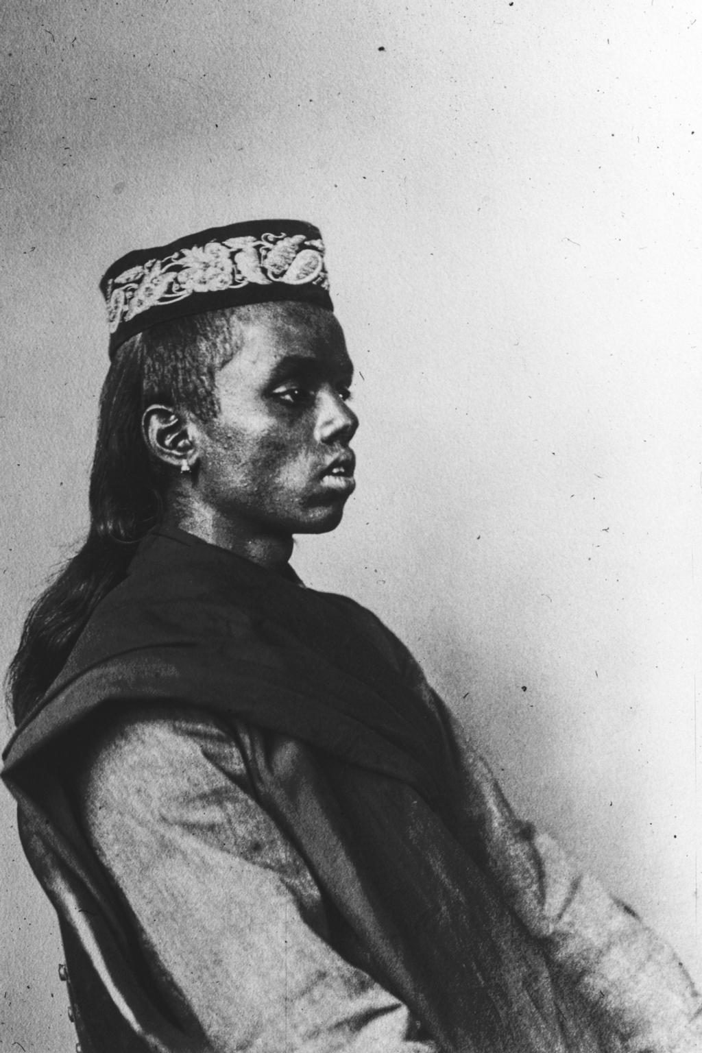 Thumbu Sammy, aged seventeen, photographed in profile at Ellis Island on 14 April 1911