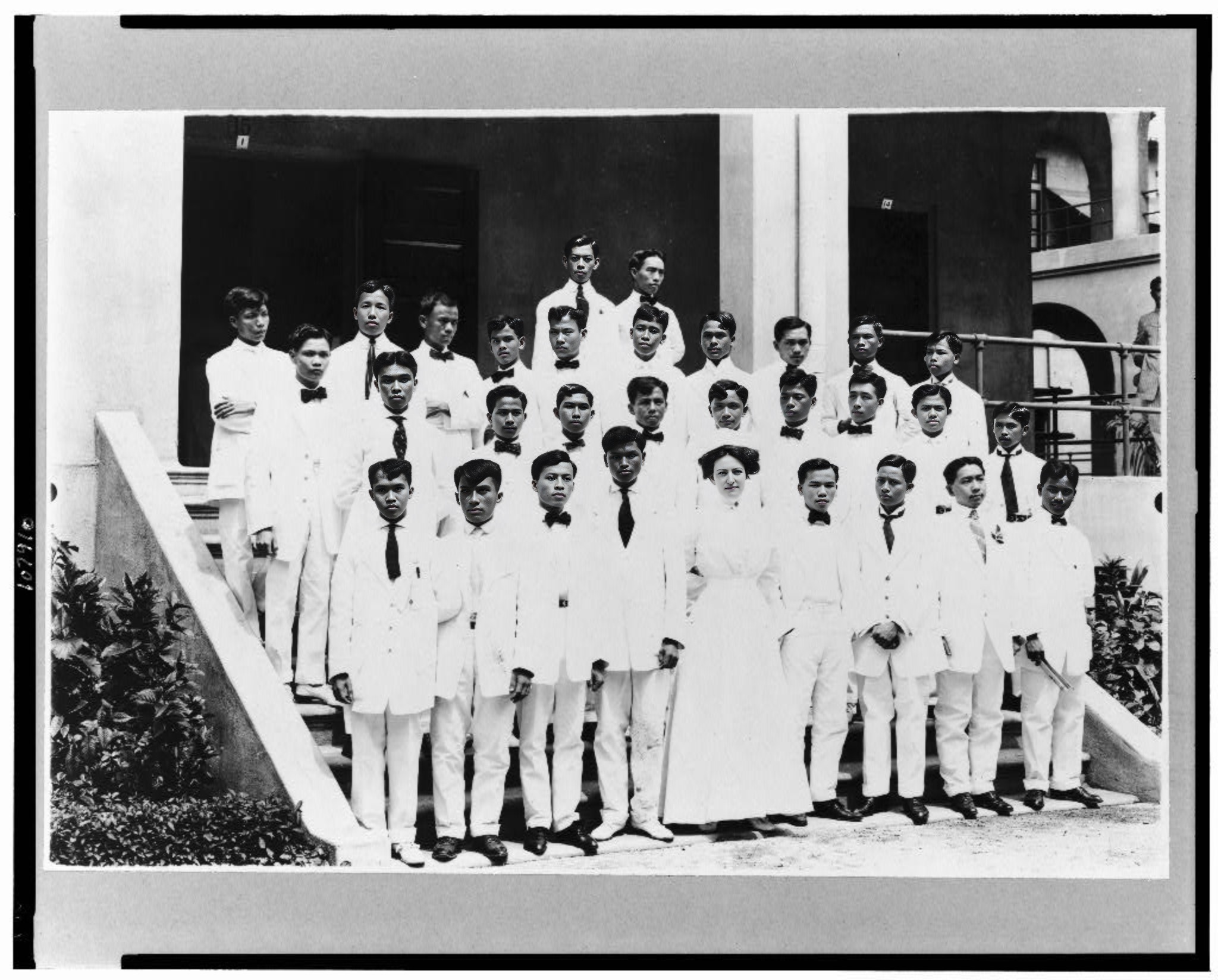 Same portrait with sharpened facial detail while preserving the likeness