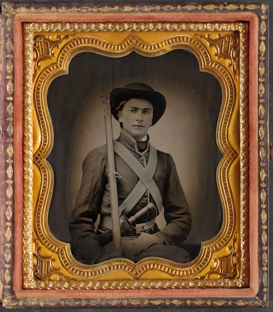 Same ambrotype restored with dramatically recovered contrast and detail